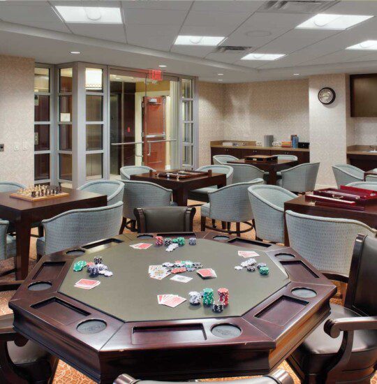 dominos, chess, poker, backgammon & many other games set up in the game room at The Stayton