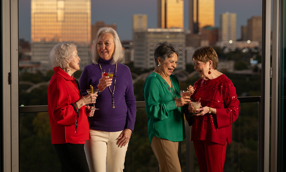 Group of elderly ladies having a drink together.