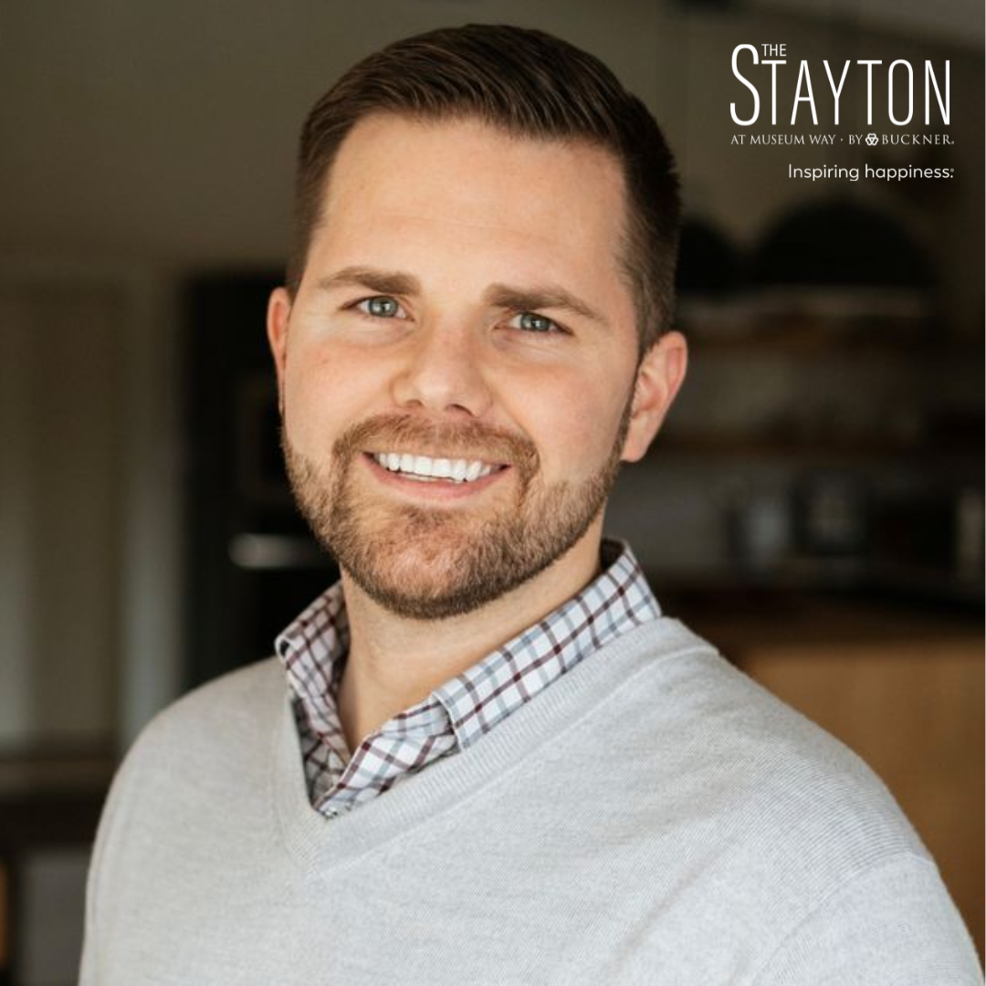 Advertisement of man smiling for the front of an ad.
